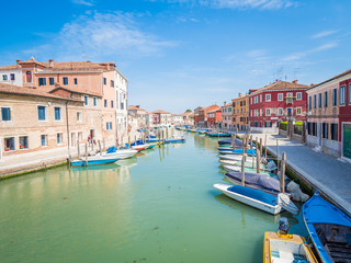 Fototapeta na wymiar Venice, Italy - Among the canals of the island of Murano, famous for its artistic glass craftsmanship