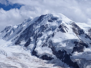 Fototapeta na wymiar Impressive Lyskamm mount and glacier at Monte Rosa massif landscape of swiss alpine mountain range in Alps, SWITZERLAND