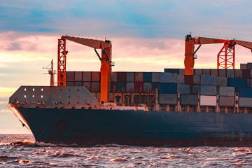 Blue container ship underway