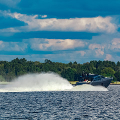 Fototapeta premium Grey motor yacht in move