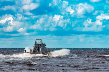 Grey military ship at sea © InfinitumProdux
