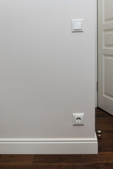 electric outlet in a wall in an new house interior