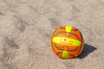 ball lying on the beach sand