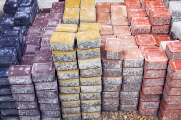 pile of colored concrete paving slab close up