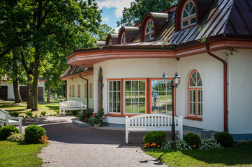 One of the entrances to the manor in a beautiful summer day. Tourist Destination. Saka manor. Estonia. Baltic.