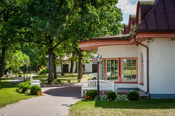 One of the entrances to the manor in a beautiful summer day. Tourist Destination. Saka manor. Estonia. Baltic.