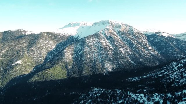Drone flight in snowy mountains of Greece. Locations - Ziria Ski Center. Multiple moves and shots. Great view.