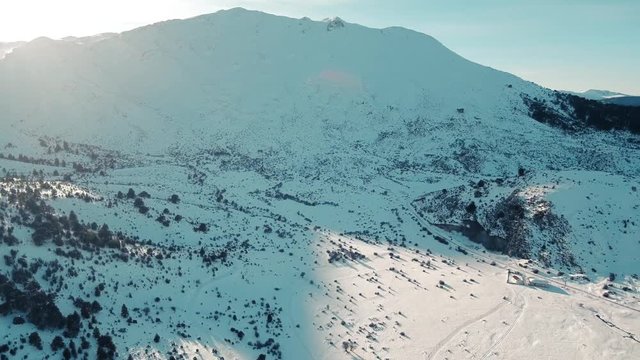 Drone flight in snowy mountains of Greece. Locations - Ziria Ski Center. Multiple moves and shots. Great view.