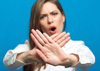 Screaming woman showing stop symbol.