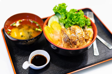 Teriyaki chicken set menu isolated on white background. Teriyaki chicken with rice, vegetables and miso soup. Japan's traditional food styles.
