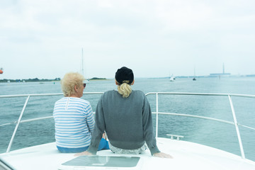 Mum and daughter chatting on the front of the family cruiser
