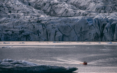 glacier lagoon in iceland, jokulsarlon lagoon close up with a boat in the water