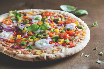 Pizza with vegetables and cheese