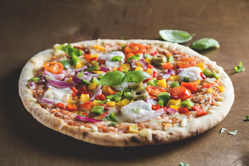 Pizza with vegetables and cheese