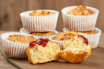 Homebaked Ham And Cheese Muffins In Paper Cases. Ketchup.