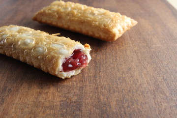 cherry pie Oil fried wild berries jam on a wooden background