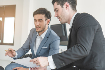 Business team casual meeting and discussing in workplace.