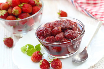 Strawberry jam in a glass bowl