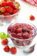 Strawberry jam in a glass bowl