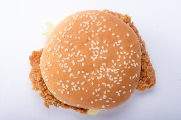 Crispy chicken burger with lettuce, cheese, and mayonnaise