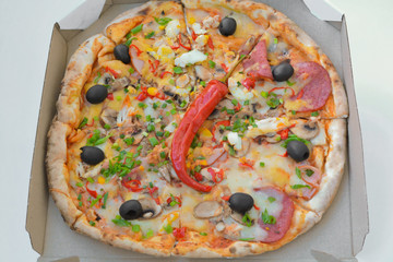 hot delivery pizza in box 