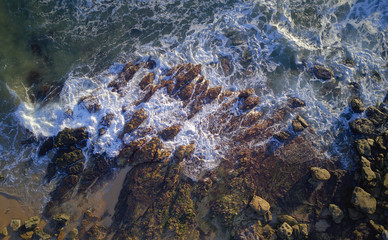 Aerial view of the wave on beach