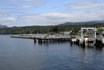 view from the Powell River harbour towards ferry pier and  the northern shoreline with the marina in the background, British Columbia Canada