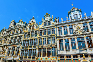 Fototapeta premium City buildings facade at Grand Place in a sunny day