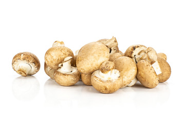 Fresh raw brown champignons stack isolated on white background raw mushrooms.