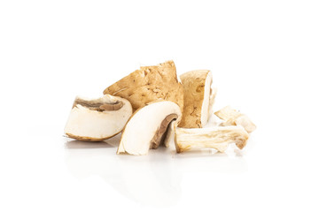 Sliced brown champignons stack isolated on white background fresh and raw.