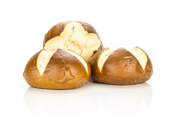 Fresh Bavarian bread buns stack isolated on white background three baked loaves.