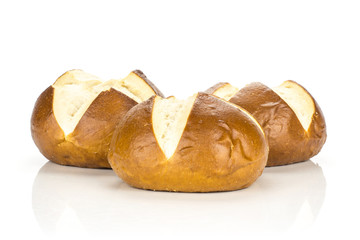 Fresh Bavarian bread buns set isolated on white background three baked loaves.