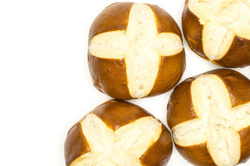 Bavarian bread buns top view isolated on white background fresh baked loaves.