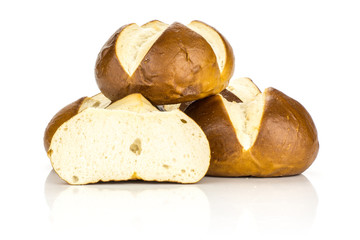Bavarian bread buns heap and one secton half isolated on white background fresh baked loaves.