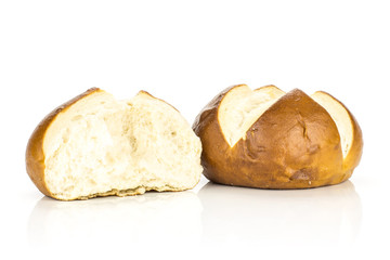 Bavarian bread bun and one broken isolated on white background fresh baked loaves.