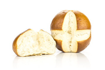 Bavarian bread bun with one broken isolated on white background fresh baked loaves.