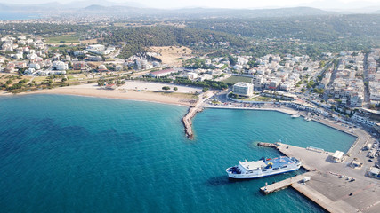 Aerial drone bird's eye view of famous port of Rafina with passenger ferries travel to Aegean islands, Attica, Greece