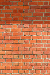 Texture of a red brick wall background