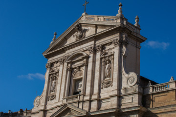 Fototapeta na wymiar old ancient building in rome italy, against blue sky. roman culture 