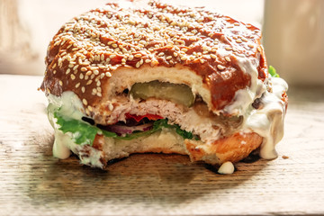 Hamburger with bite taken off