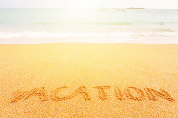 Beautiful sunny beach by the blue sea. Inscription 