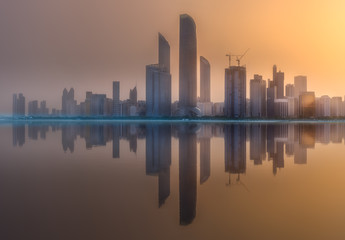 Fototapeta na wymiar View of Abu Dhabi Skyline at sunset, UAE