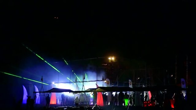 night disco with lasers on the beach of the resort