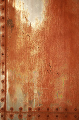 Rusty background with rivets