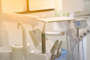 Dental, dental instruments in the dental lab. dental unit. Warm light from the filter.