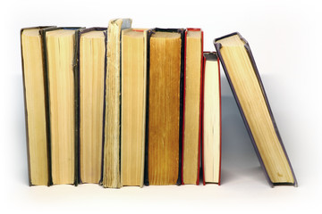 a lot of old books on a light background