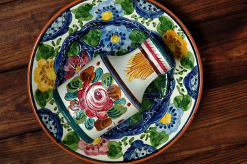 Porcelain plate and jug on the table