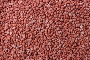 Mineral fertilizer with phosphorus in red