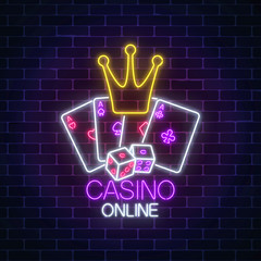 Glowing neon sign of casino online games. Casino bright signboard. Internet gambling banner.