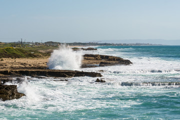 The waves of the Mediterranean Sea break up on the shore of Israel near Rosh HaNikra.